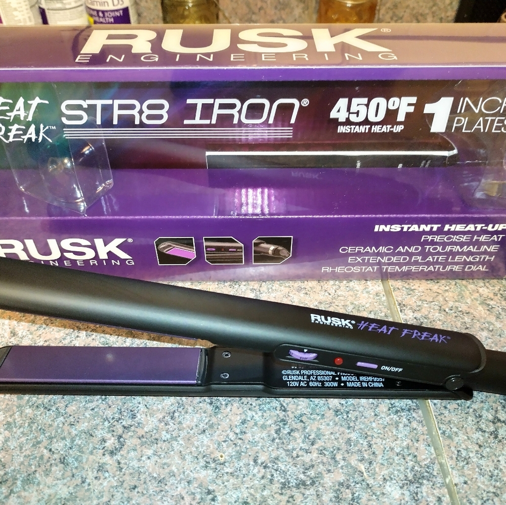 New rusk tourmaline flat iron